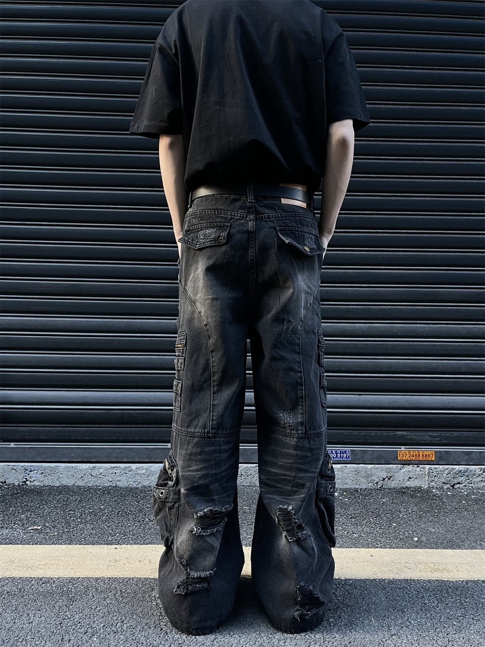 alternative man wearing Wide Leg Black Jeans